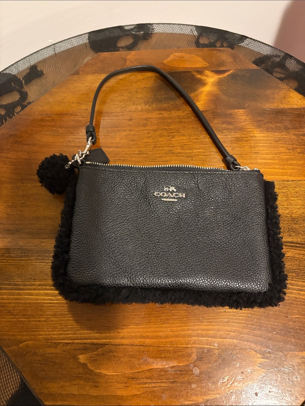 Coach Black Pebbled Leather Wristlet with Shearling Edge and Pom